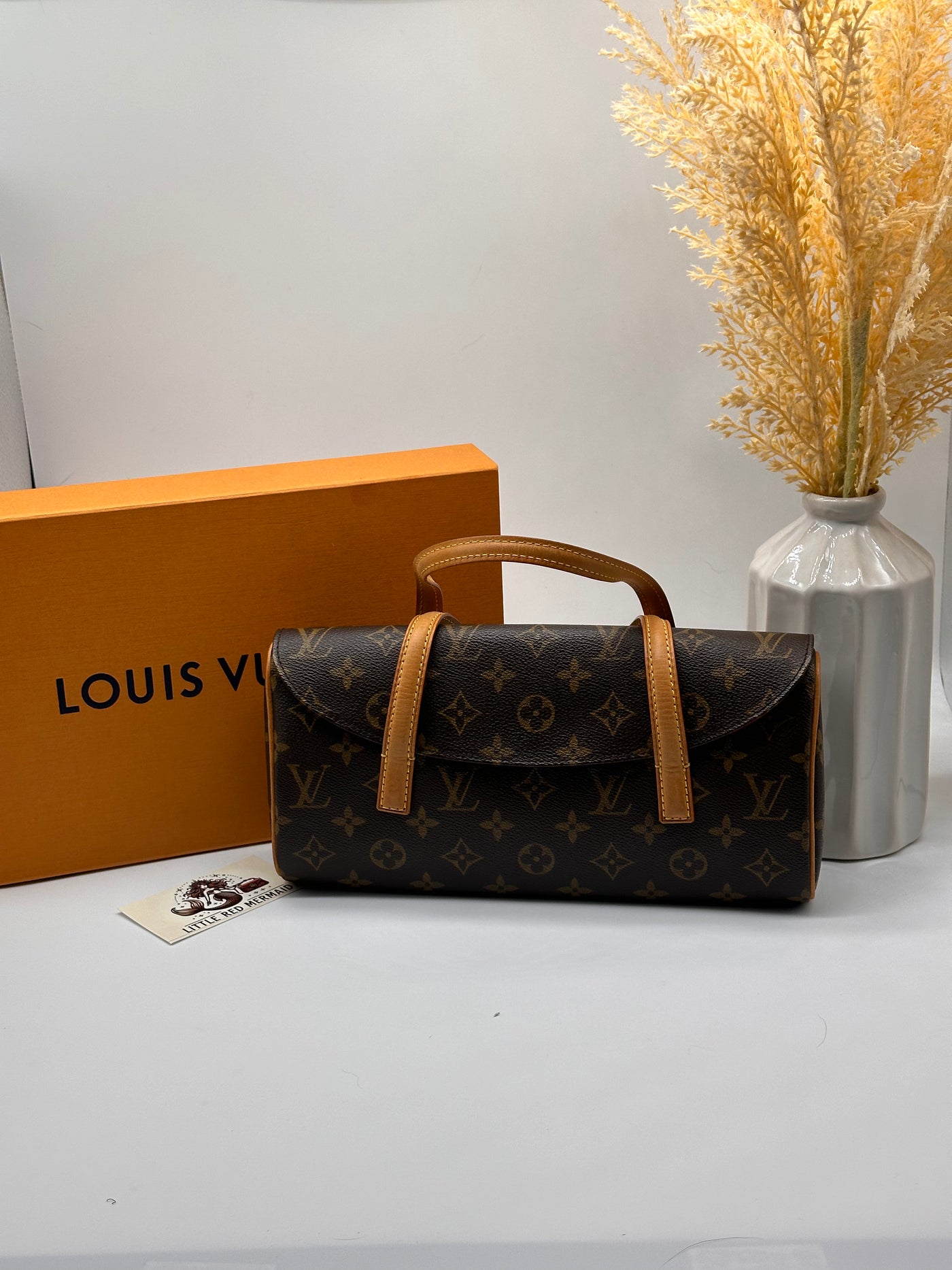 LOUIS VUITTON Sonatine Monogram Handbag